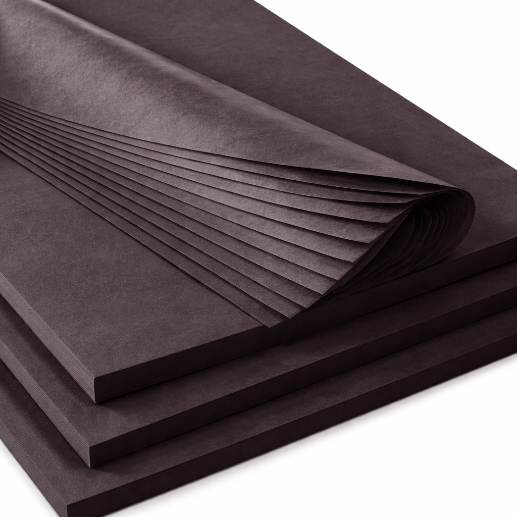 Close up of cut tissue paper sheets showing clean guillotine edge