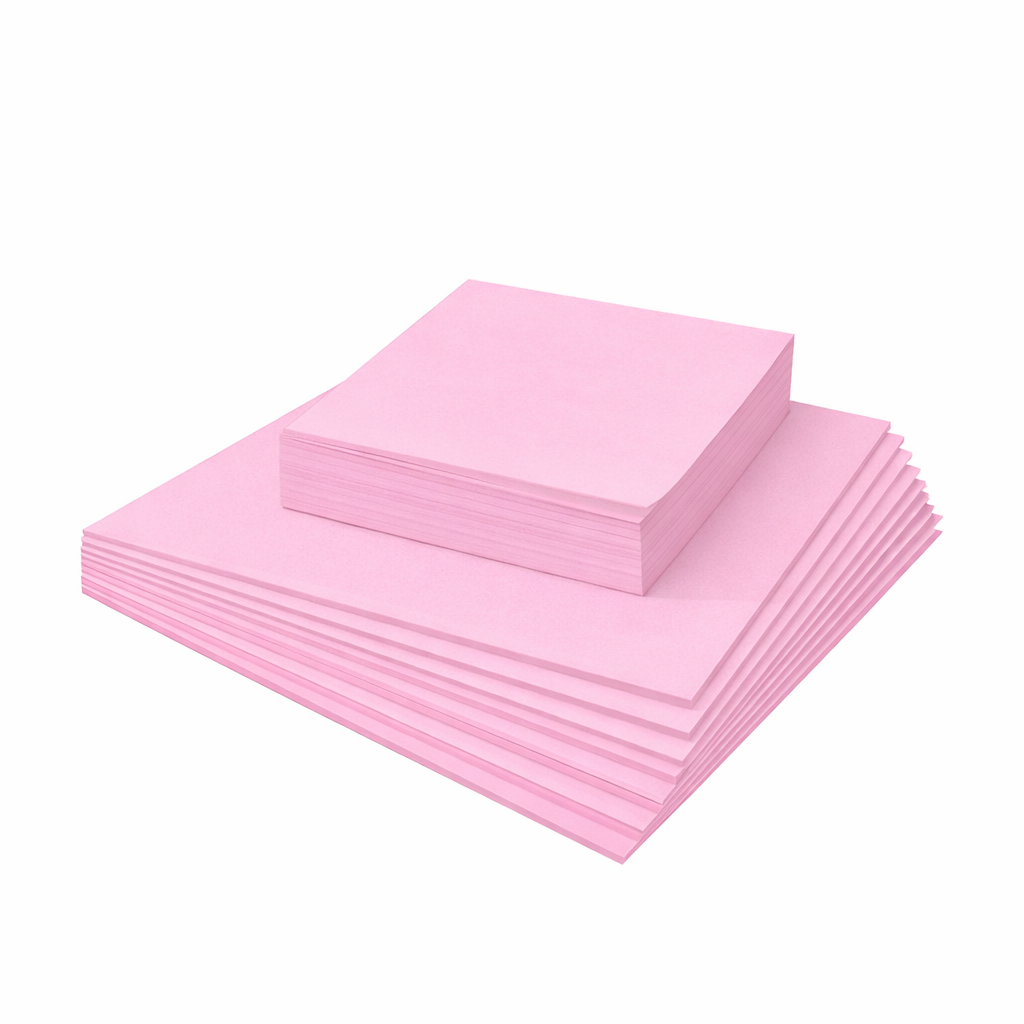 Large and small custom cut pink tissue paper sheets stacked