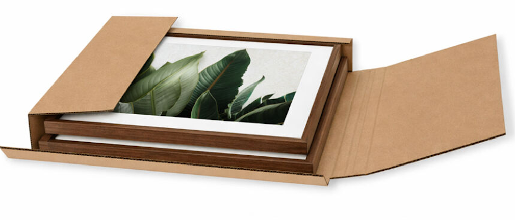 Picture frame packed in a multi crease box