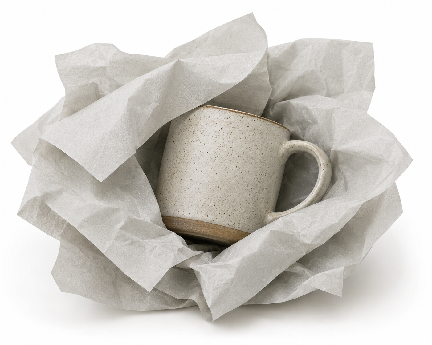 Ceramic mug wrapped in recycled tissue paper ready for dispatch
